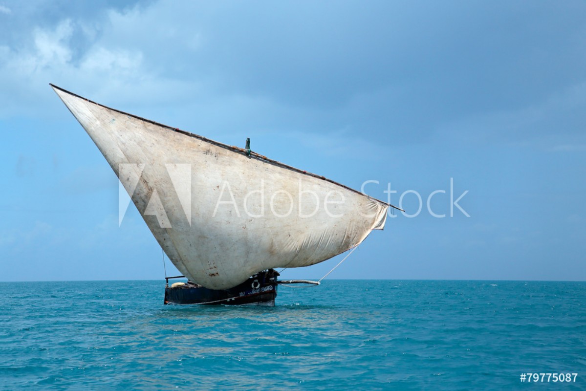 Afbeeldingen van Wooden sailboat dhow on water Zanzibar